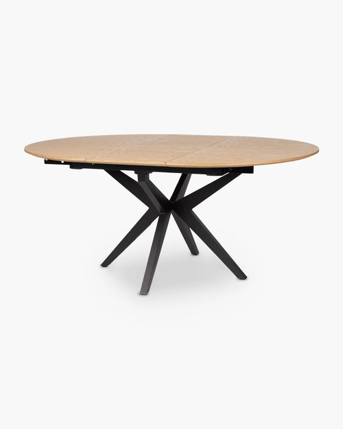 Ronde uitschuifbare eettafel in hout