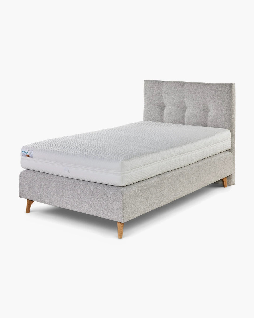 Boxspring met gecapitonneerd hoofdbord in stof