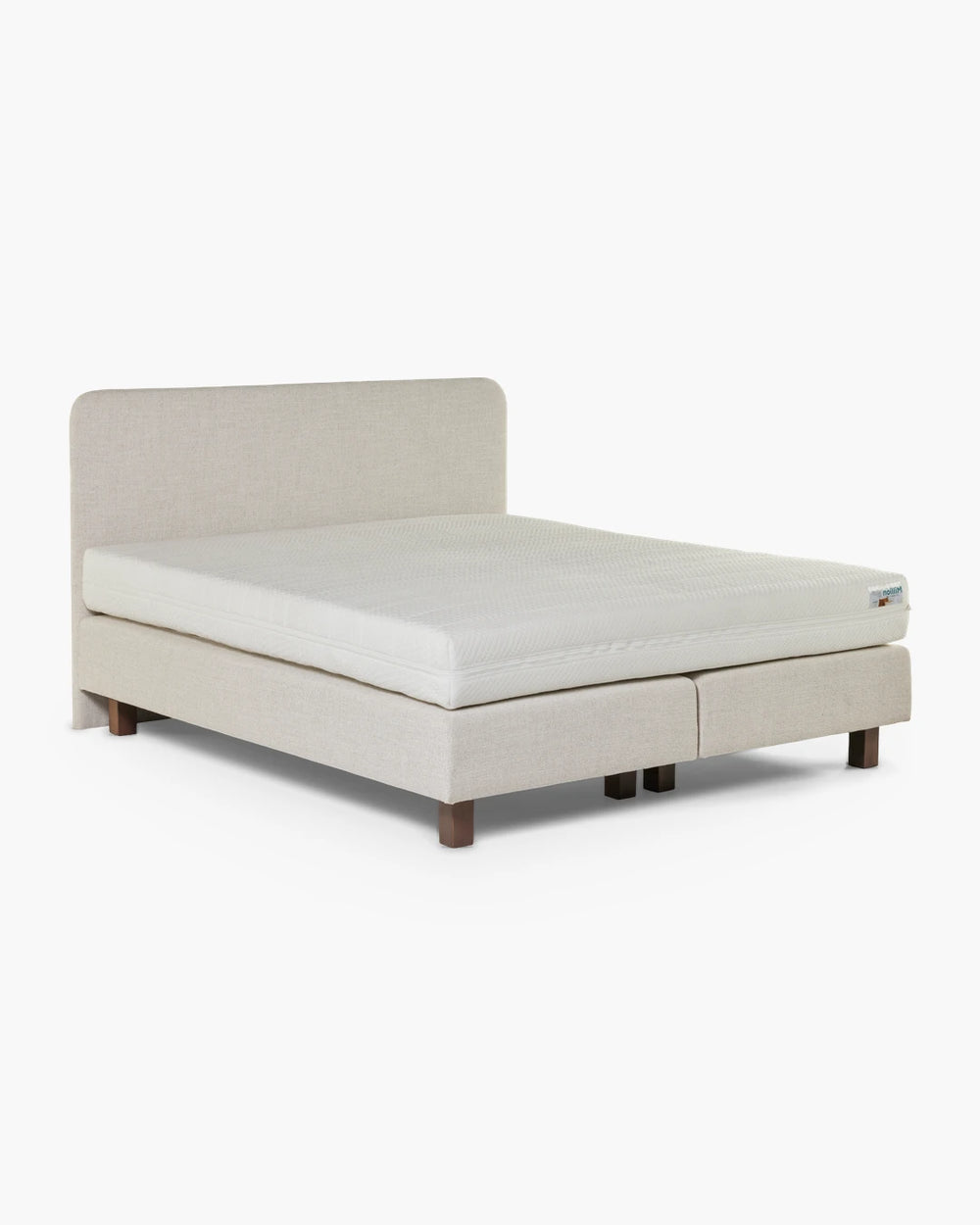 Gestoffeerde boxspring met hoog hoofdbord