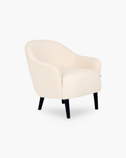 Clubfauteuil in beige stof voor de woonkamer