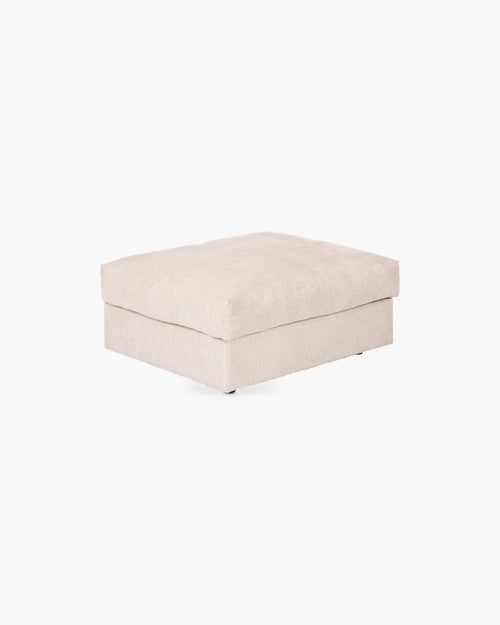 Poef in beige stof