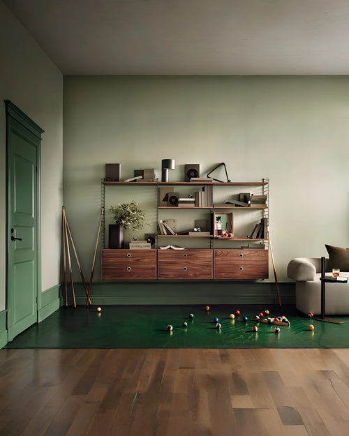 Wandrek in walnoot van String Furniture